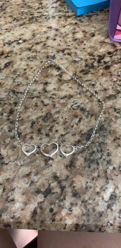 Silver chain necklace with heart pendant