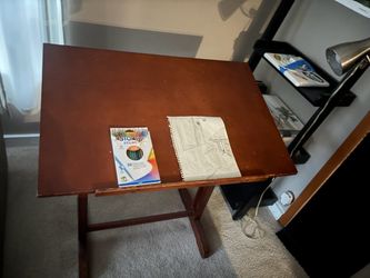 Adjustable drafting table