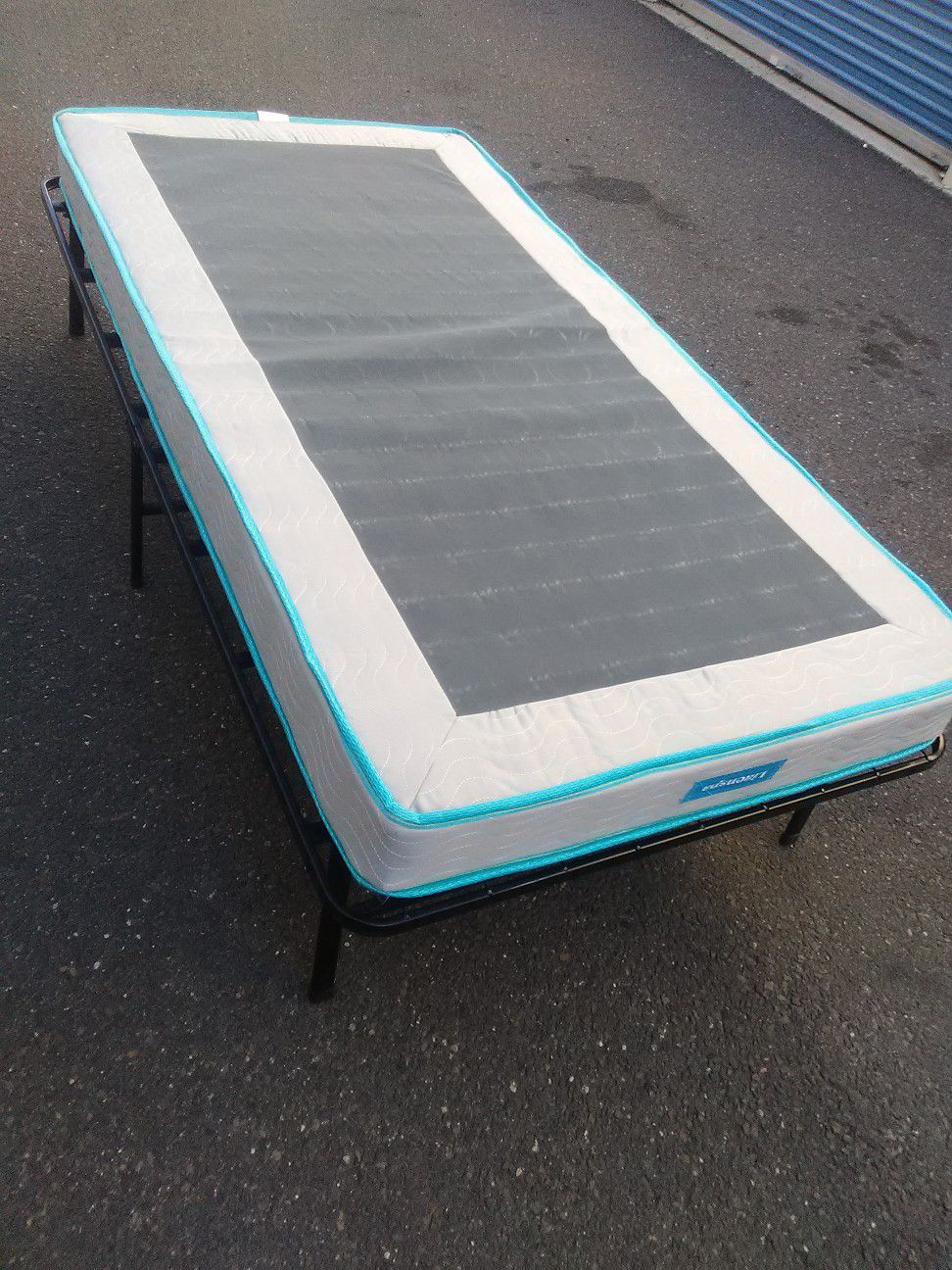 Twin size folding bed excellent new condition lightweight space saver ready for immediate use a couple curbside delivery possible
