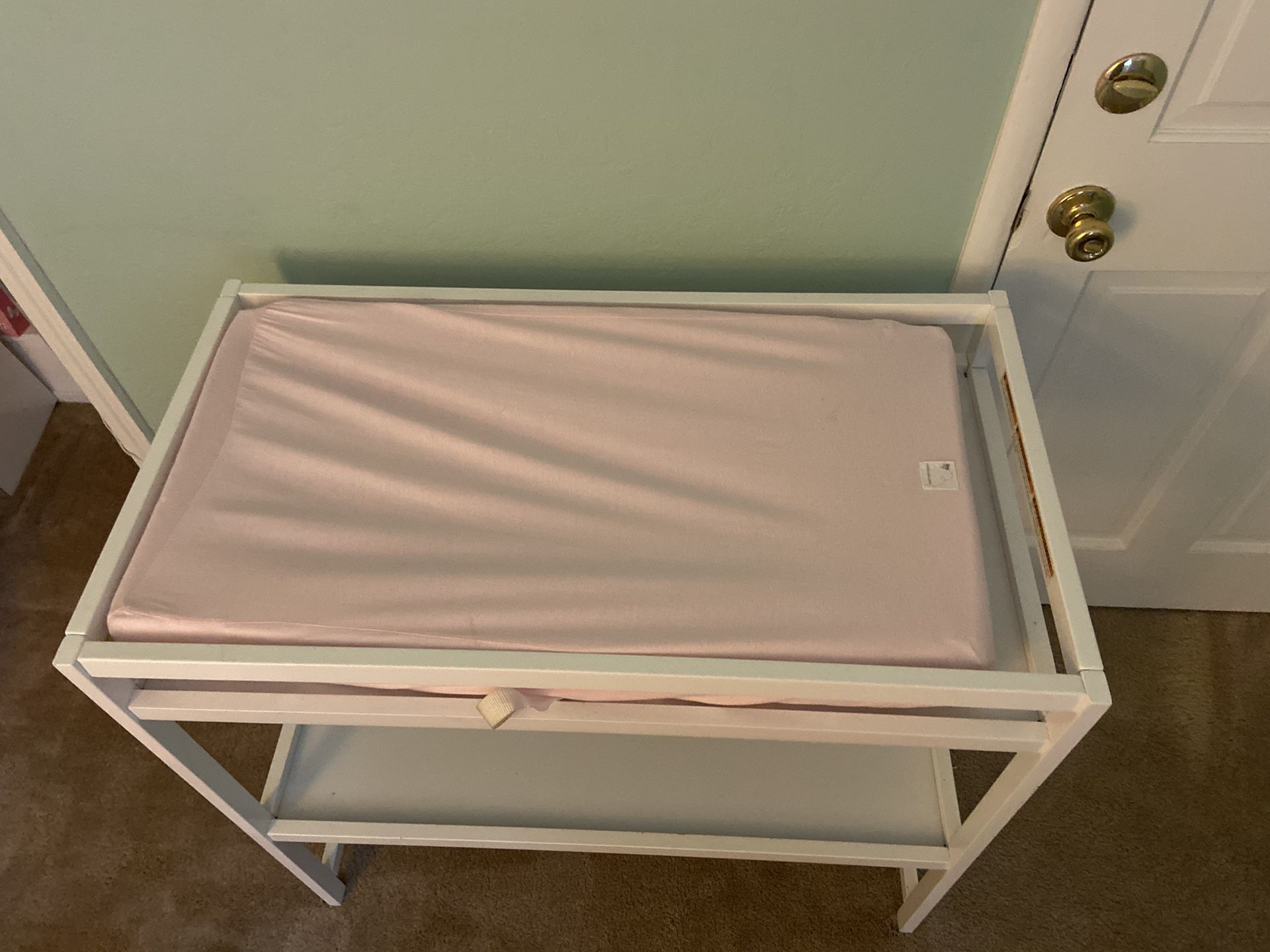 Changing table with pad and cover