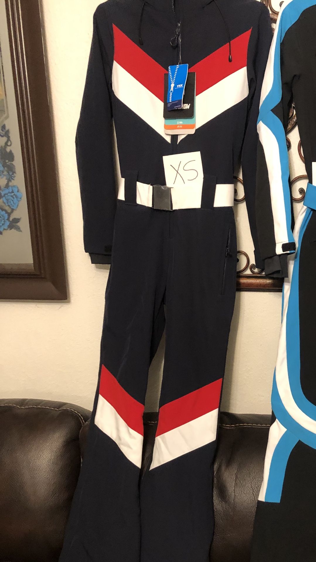 WOMEN’S NAVY   SLIM FITS WATERPROOF  SKI  SUIT. AND SPYDER SKI BIB. ASKING 100 EACH 