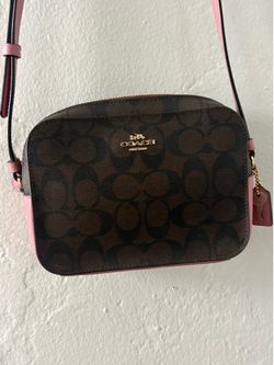 brown and pink matching Coach purse and wallet