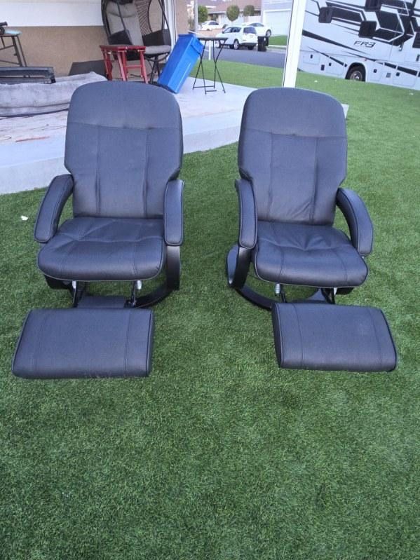 2 Black reclining chairs