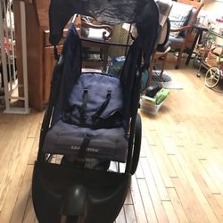 A Nice Baby Jogger , With  Nice Big Wells, In Good Condition , Good For The Baby 