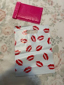 Plastic Gift Bags and Pink Bubble Mailer