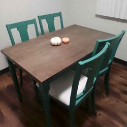 Like New Never Used Brown Wood Table With 4 Teal Blue Chairs 