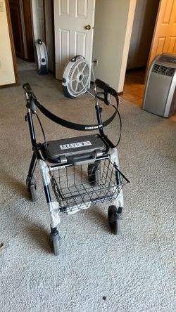 In like new condition, wheeled walker