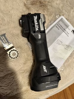 Makita XMT04 Oscillating Tool