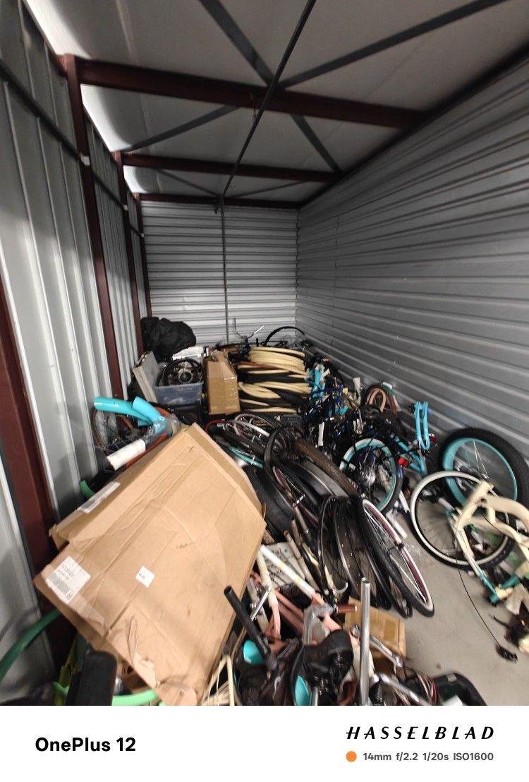 Warehouse/ Uhaul sale - tons of stuff. ebike builders, motorcycle, designer shoes Home Depot items