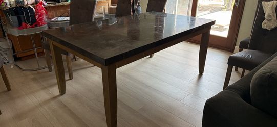 Stone top dining table