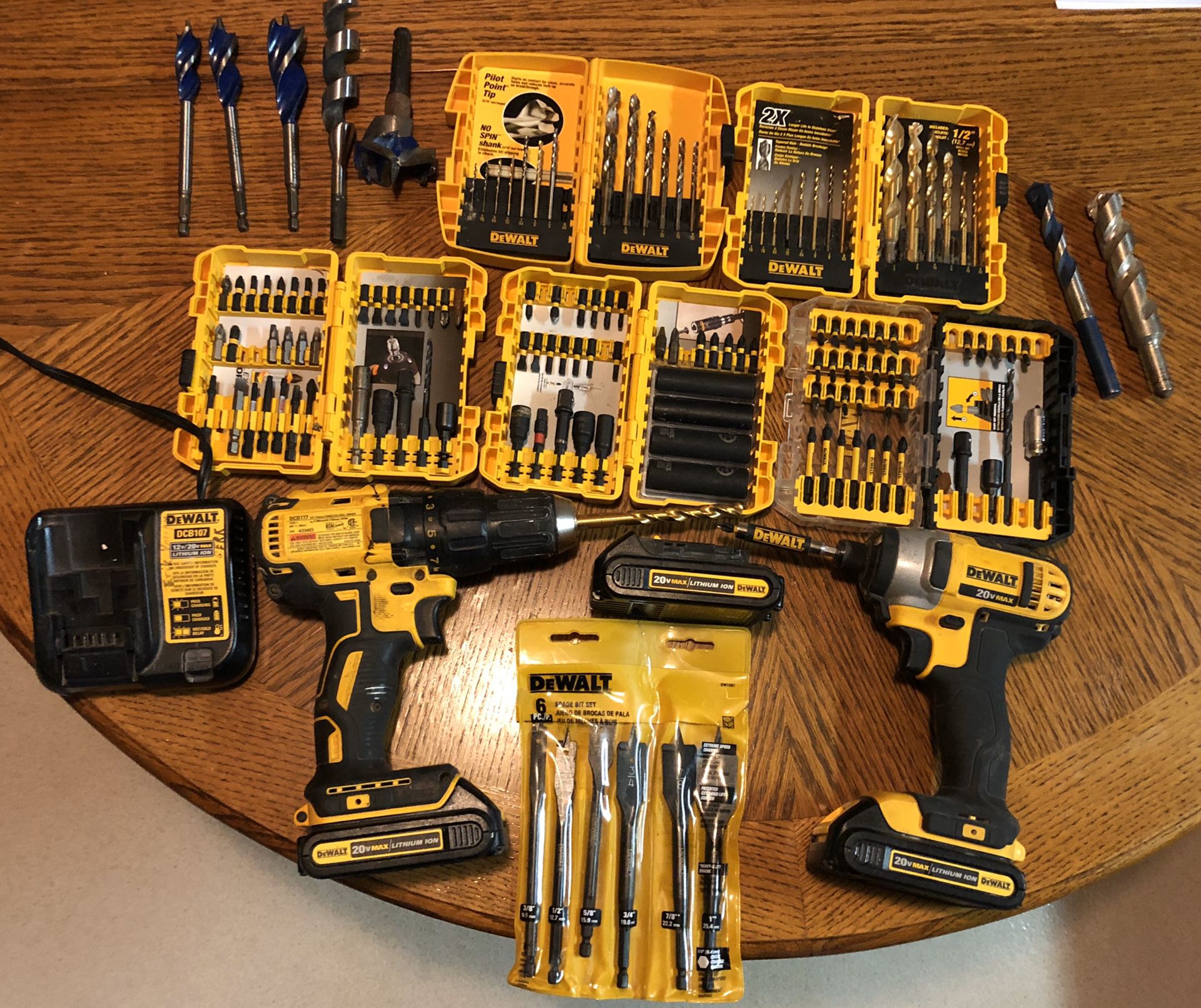 DeWalt 20 volt cordless drill and ratchet drill. Lots of assorted bits.