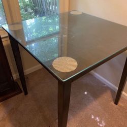 Moving sale dinning table with glass top and 2 chairs