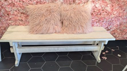 White Bench With Pink Pillows