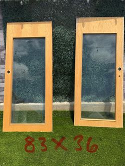 Wood and glass doors ideal for lobby $150 both