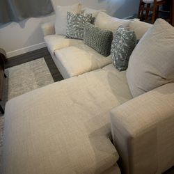 Living Spaces Shuffle 108” Sofa with Reversible Chaise – Good Condition