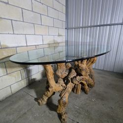 Driftwood Elegance: Glass-Top Dinning Room Table