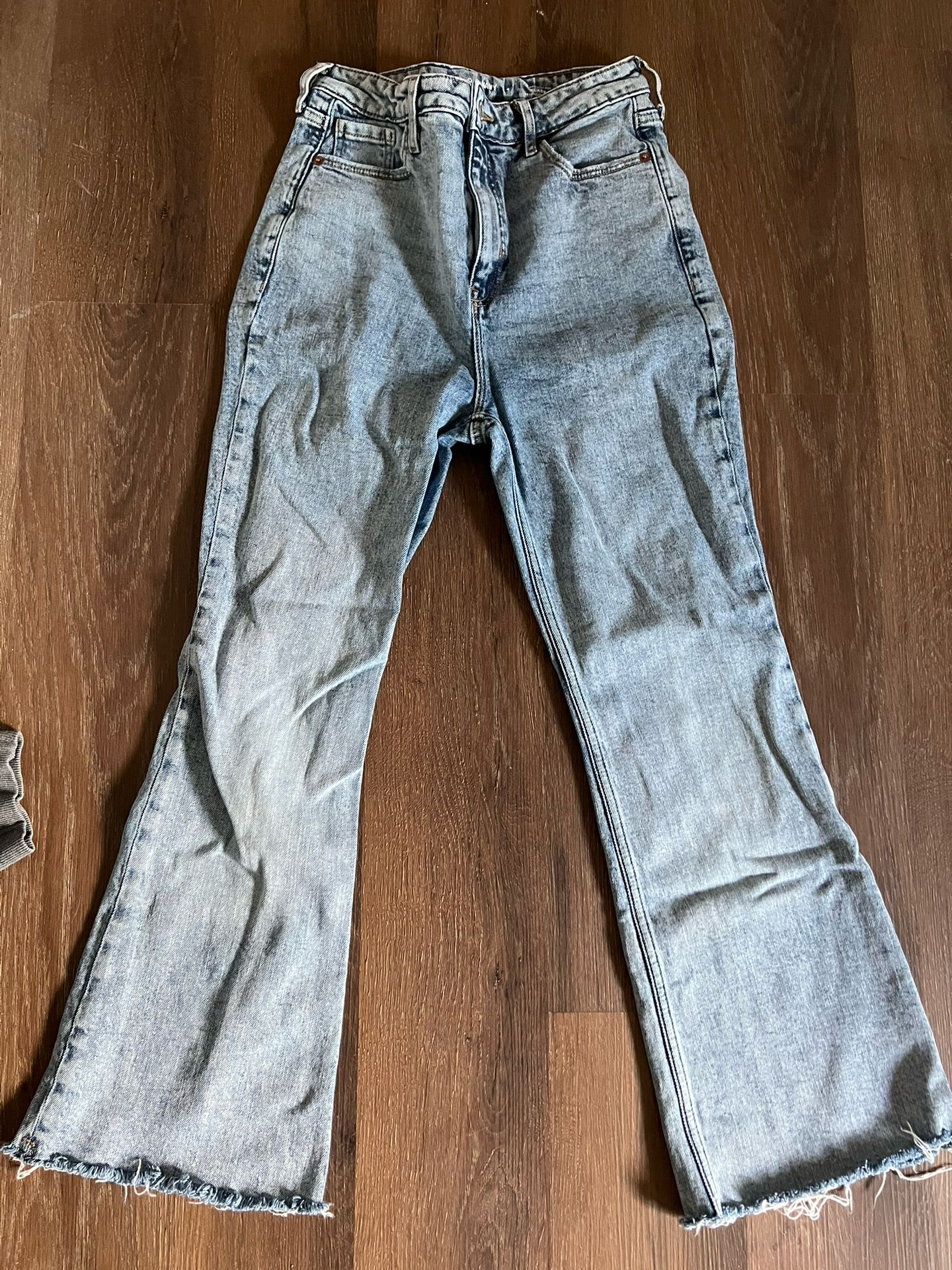 Flared Light- Washed Distressed Jeans