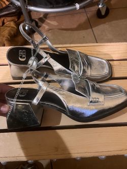 Silver sling backs
