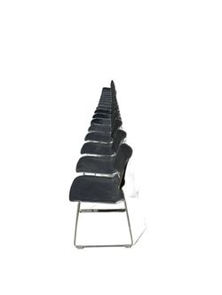 Black Stackable Chairs with Chrome Sled Base