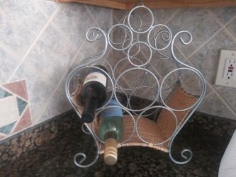 Wine Rack Holds 5 Bottles.