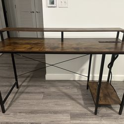 Wooden computer table with built-in outlets. 29.92 H and 55.12 W