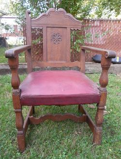 Antique carved quarter sawn tiger oak arm chair