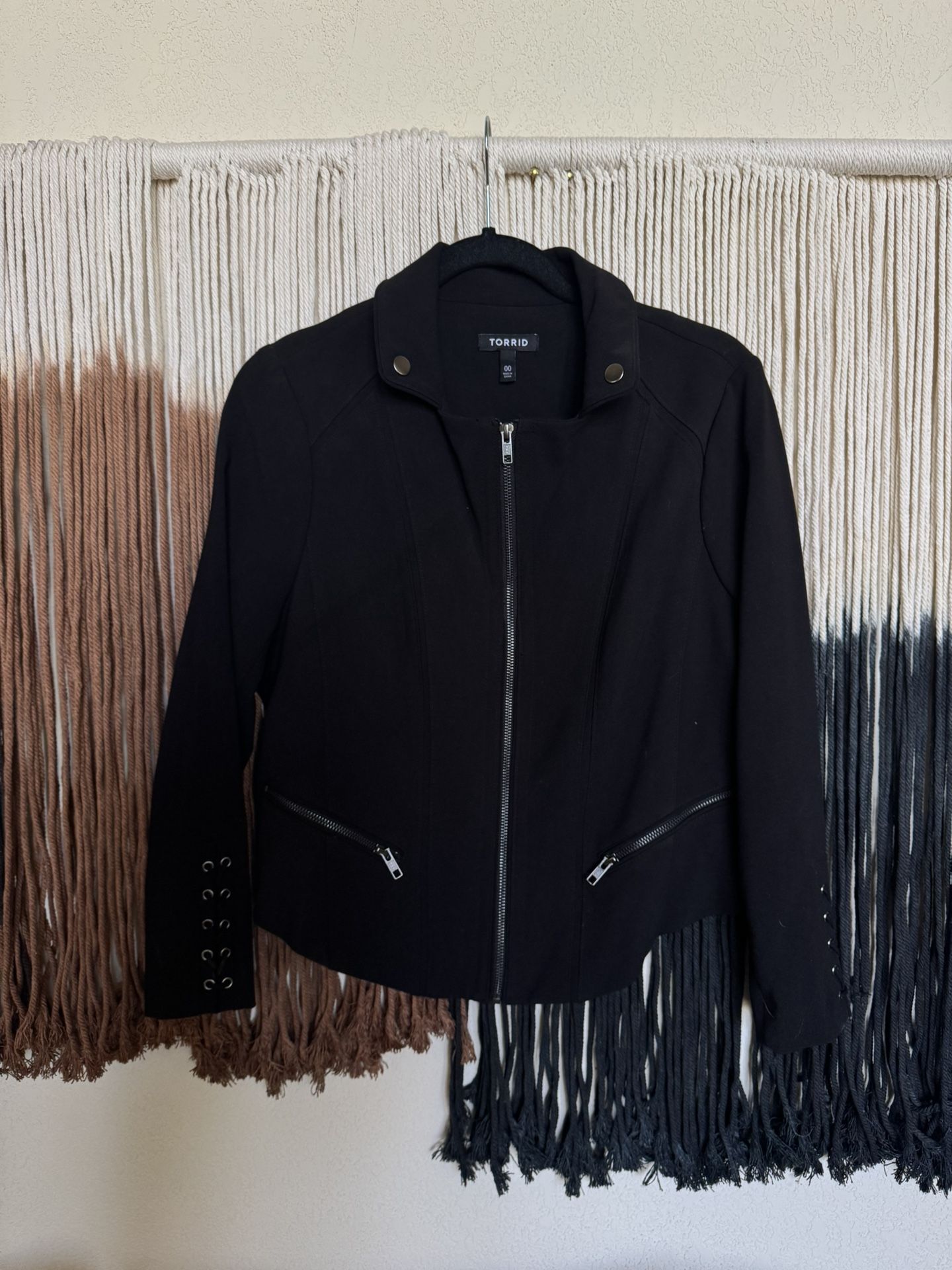 Black Torrid blazer with lace up and zipper detail; perfect condition
