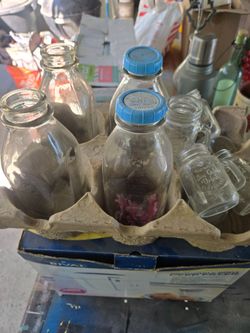Old milk bottles and little  mugs.
