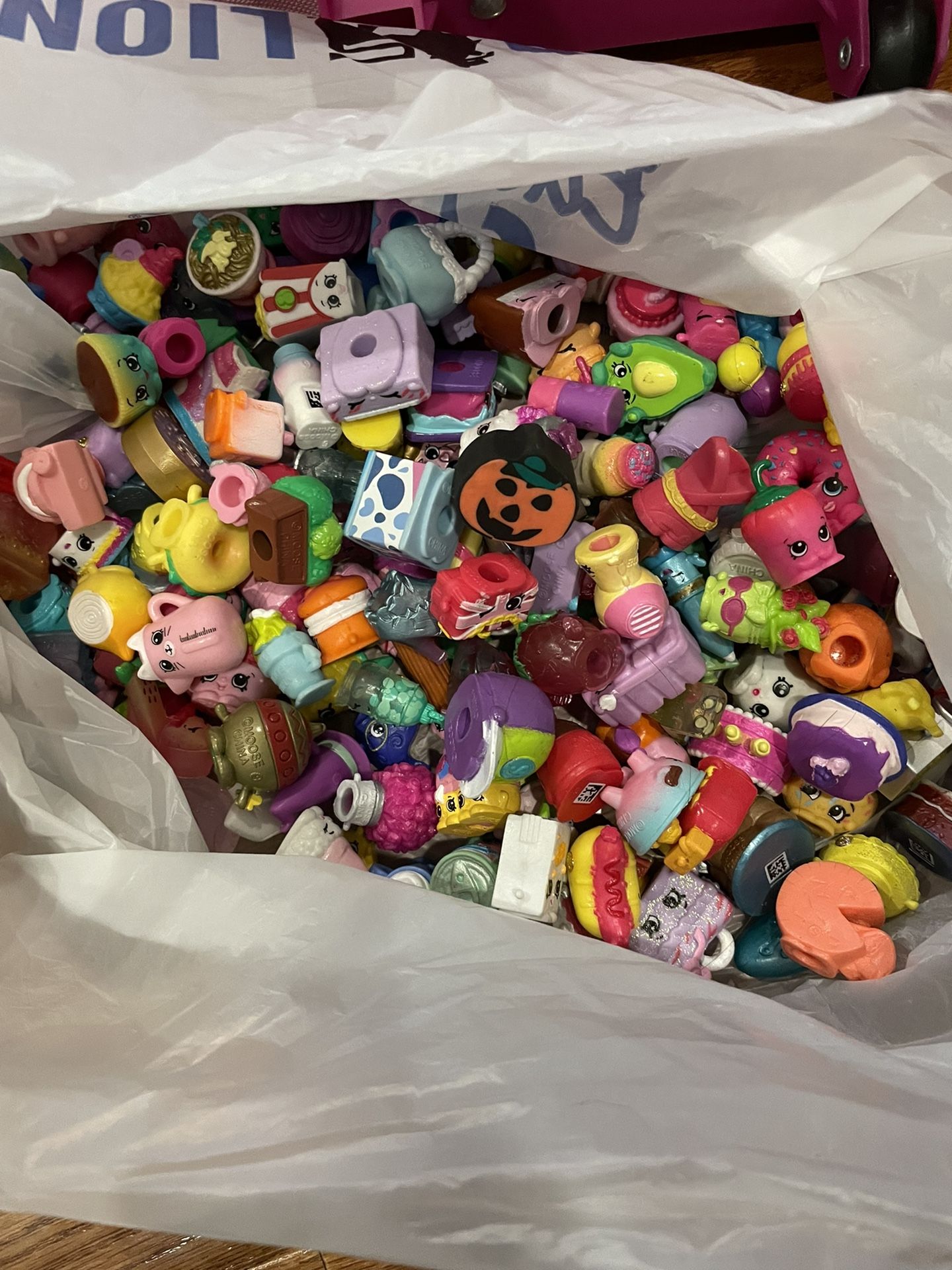 At least 100 Shopkins and Shopkins Book Bag