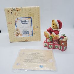 New CHERISHED TEDDIES Clarence Winter BEAR FIGURINE RETIRED 1998 Santa blocks

MINT CONDITION,  STORED IN THE BOX, never displayed
Clarence
Bear with 