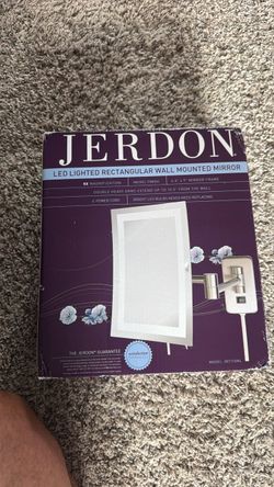 New LED lighted rectangular wall mounted mirror.