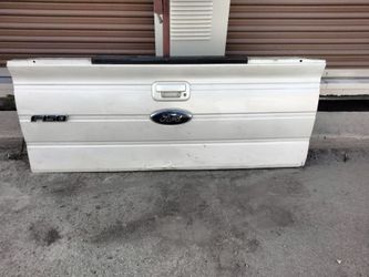 2009-2014 Ford F-150 Tailgate with accessories OEM.