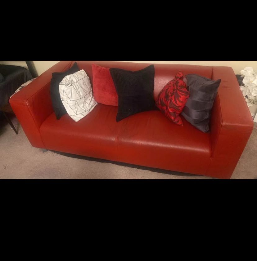Modern Red Faux Leather Couch with 6 Decorative Pillows – Great Deal! Negotiable at a decent price