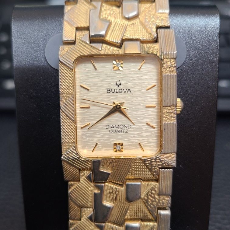Bulova diamond deals quartz 18k gold