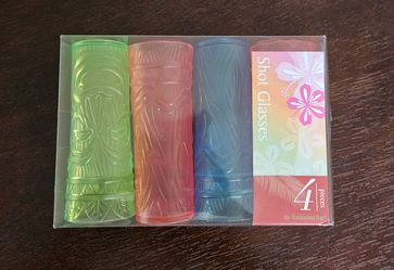 Set of 4 plastic Tiki Shot Glasses ( New in the box!)