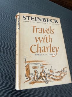 A hardcover of John Steinbeck's "Travels with Charley".