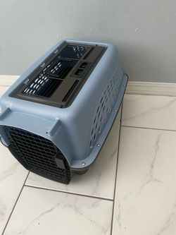 Small dog, portable cage