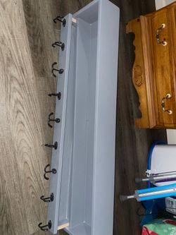 Custom-made coat rack with secret compartment