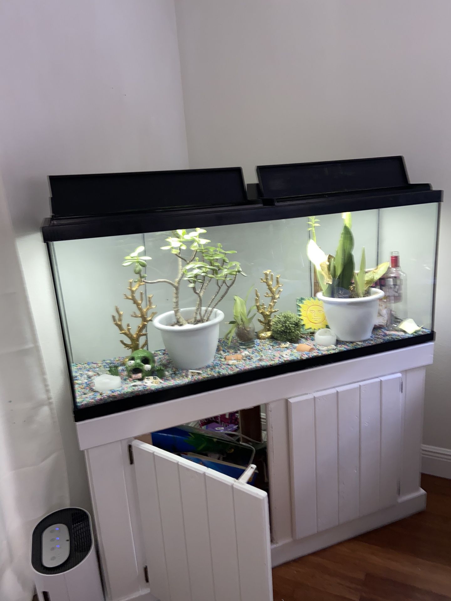 Large fish tank with white wood stand (items shown included)