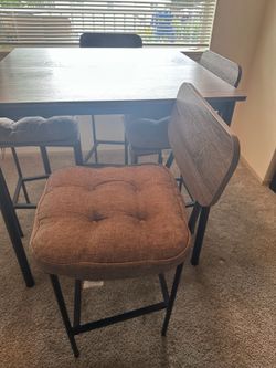 4 seater table with chairs and  seat cushions
