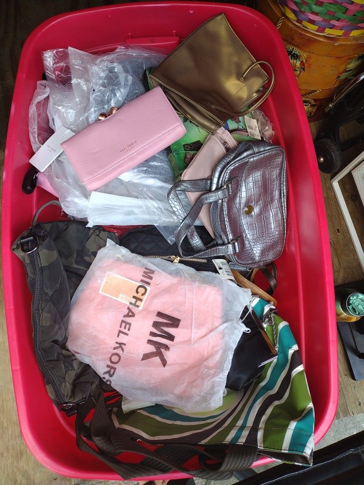 HUGE CONTAINER OF BRAND NAME NEW PURSES AND WALLETS