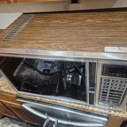 Old school Tappan microwave, woodgrain-stainless, original square tray