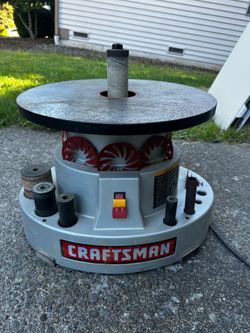 Oscillating spindle sander