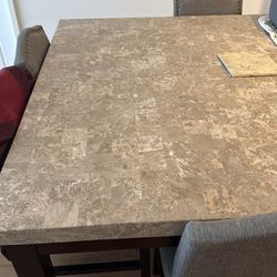 Granite table with 4 chairs