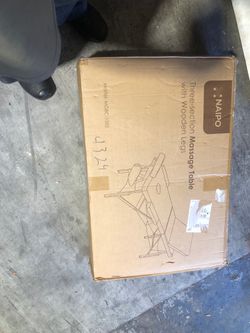 Folding massage table