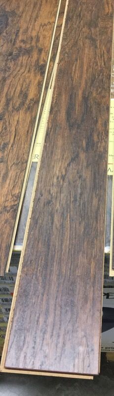 40 boxes of Hampton Bay Hickory Laminate Flooring