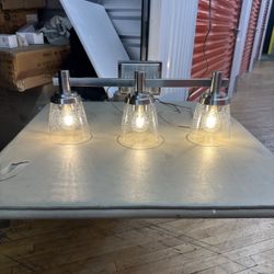 Sunset Lighting Riella 3 Light  Vanity With Clear Seeded Glass Bright Satin