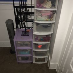 3 Plastic Cubby Drawers And A Twin Size Bed Frame