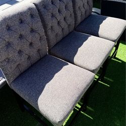 Selling 3 tufted-style bar stools.