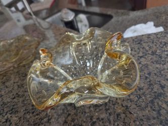 Yellow crystal with the little bubbles in them very beautiful. The three pieces